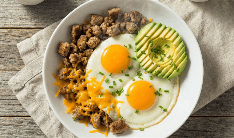 Keto breakfast power bowl with eggs, sausage, cheese, and avocado from the RedLight Freedom Fuel Kitchen